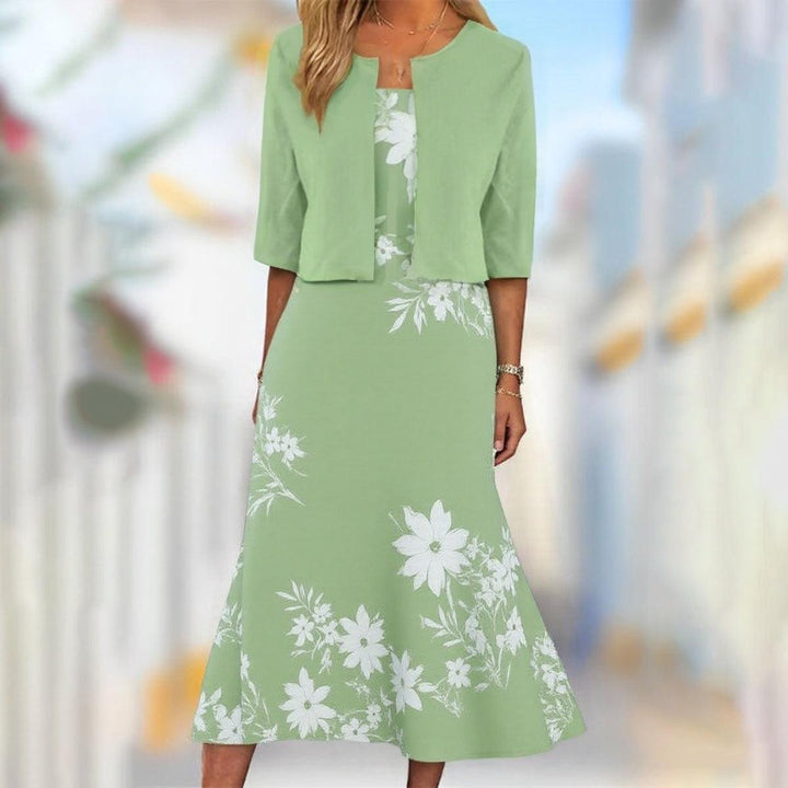 Einzigartiges Midikleid mit blauem Pflanzenmuster und Jacke