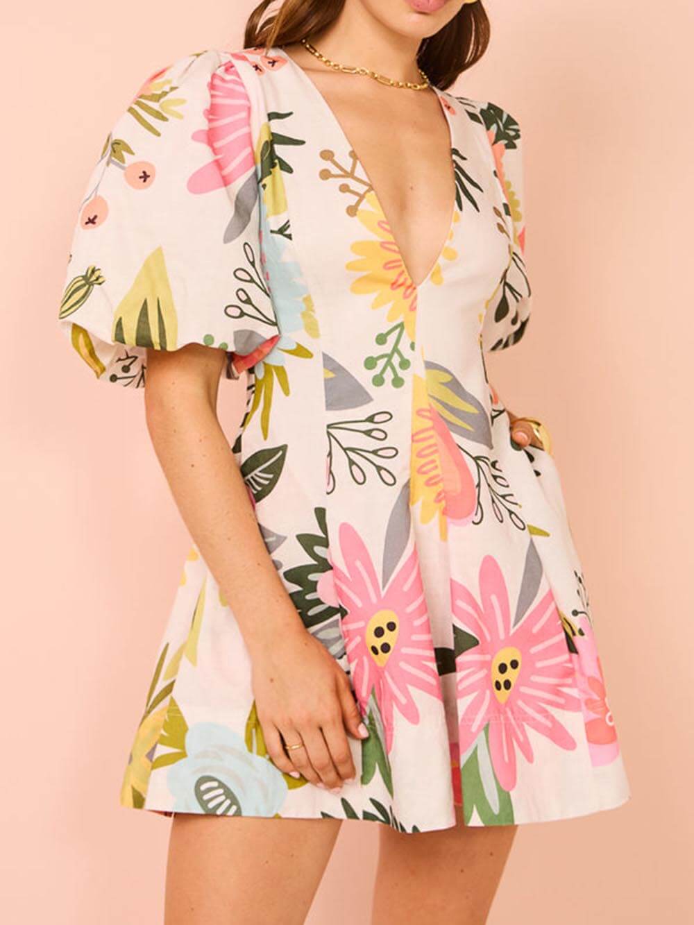 Mini-Kleid mit Puffärmeln, Blumenmuster und Taschen