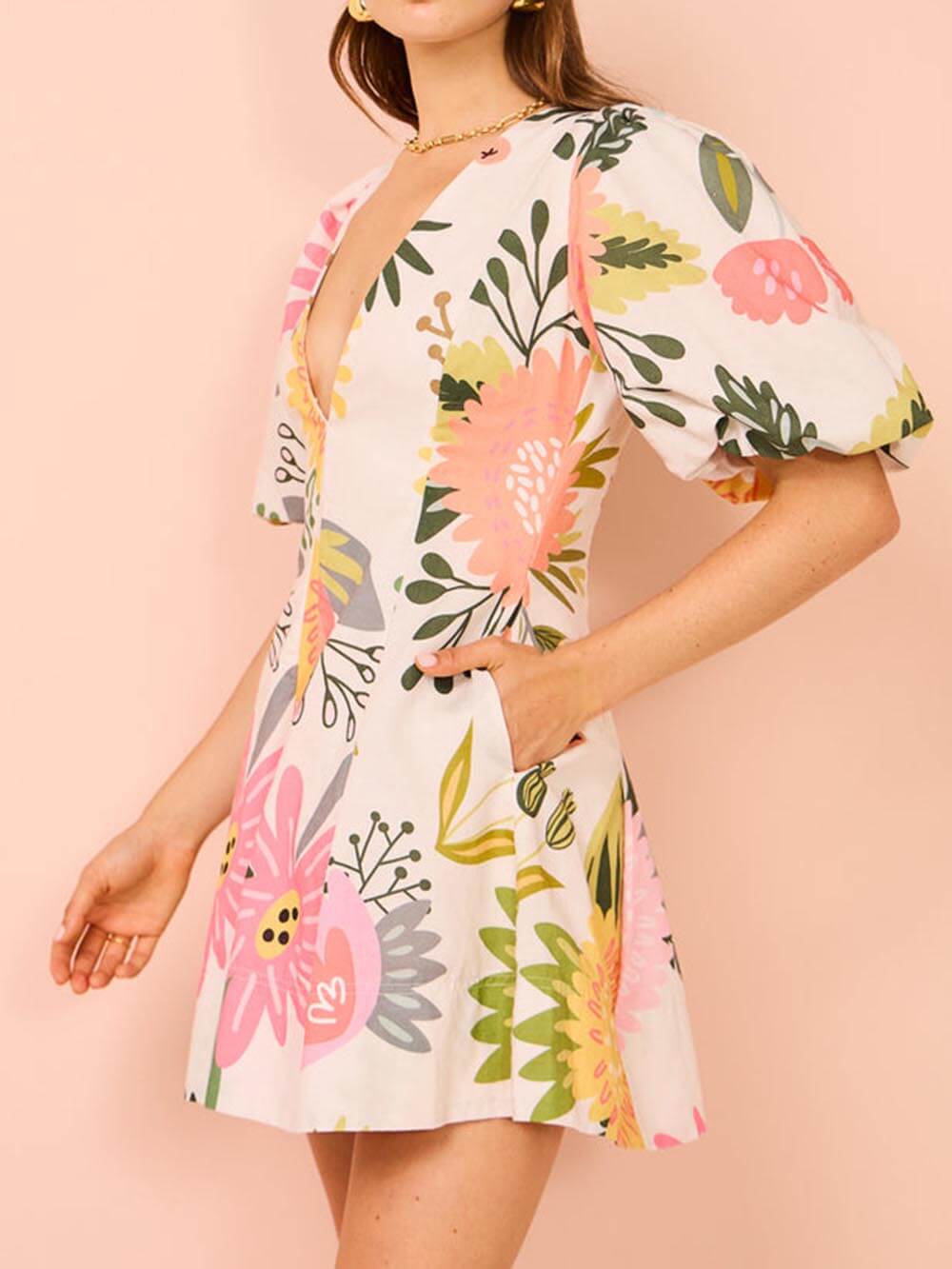 Mini-Kleid mit Puffärmeln, Blumenmuster und Taschen