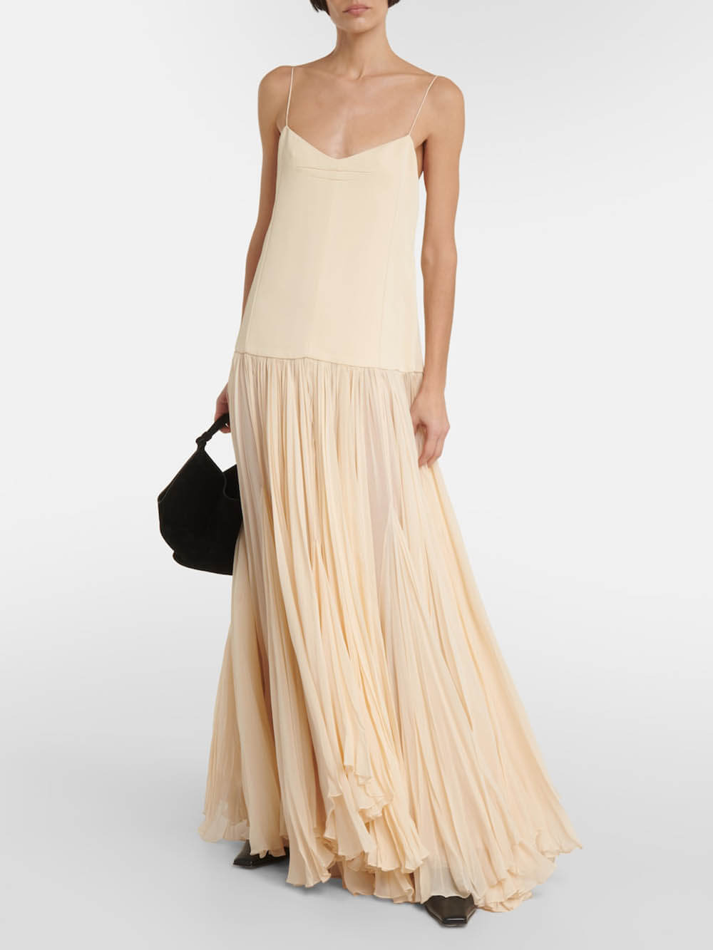 Kleid mit Trägern, tiefer Taille und unregelmäßigem Saum