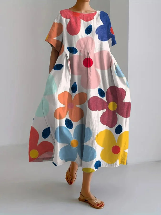 ELIANA | Blumiges Midikleid mit unbeschwertem Stil und Sommerkomfort für bunte Tage