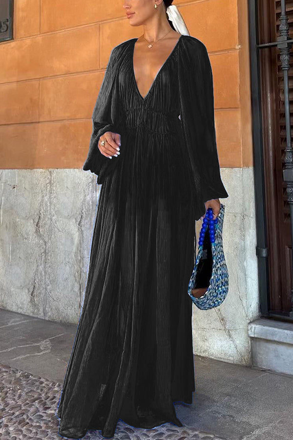 Langes blaues Kleid mit Puffärmeln und geraffter Taille