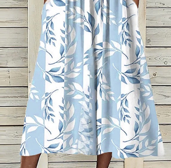 Einzigartiges Midikleid mit blauem Pflanzenmuster und Jacke