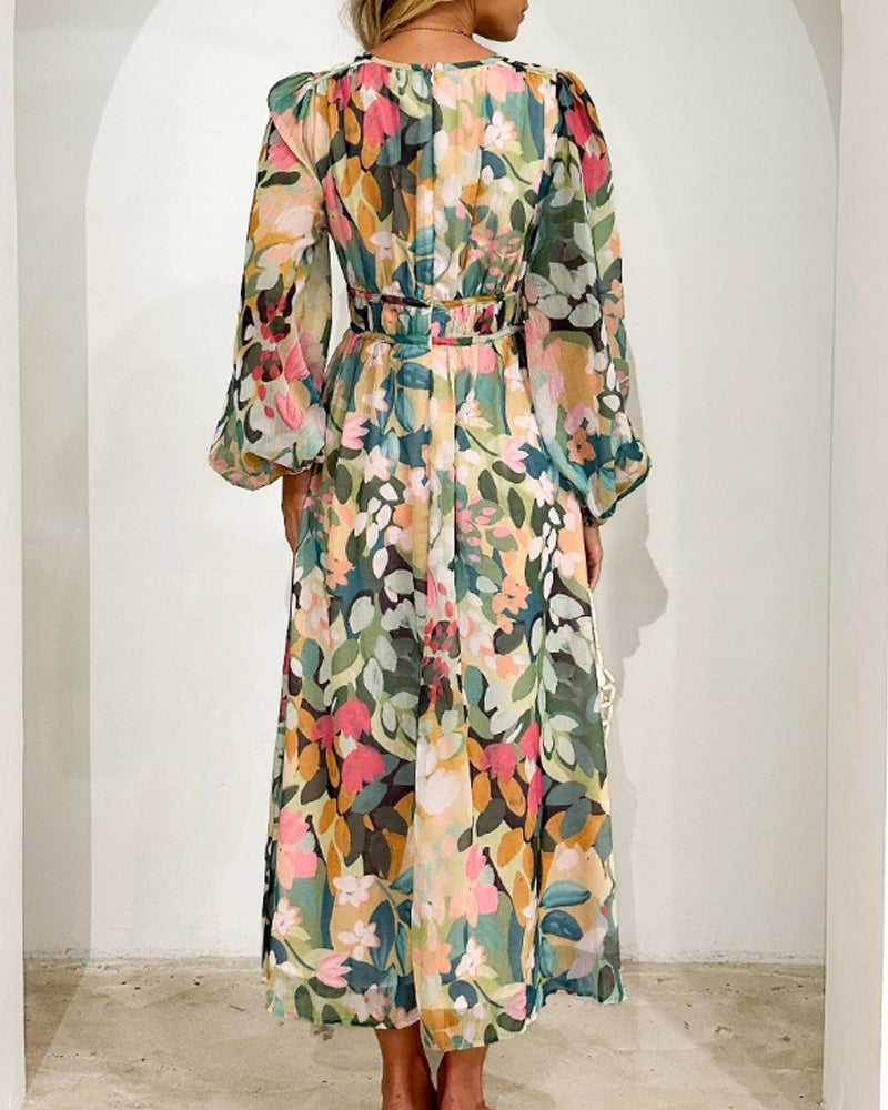 Elegantes langes Kleid mit floralem Muster und ballonförmigen Ärmeln