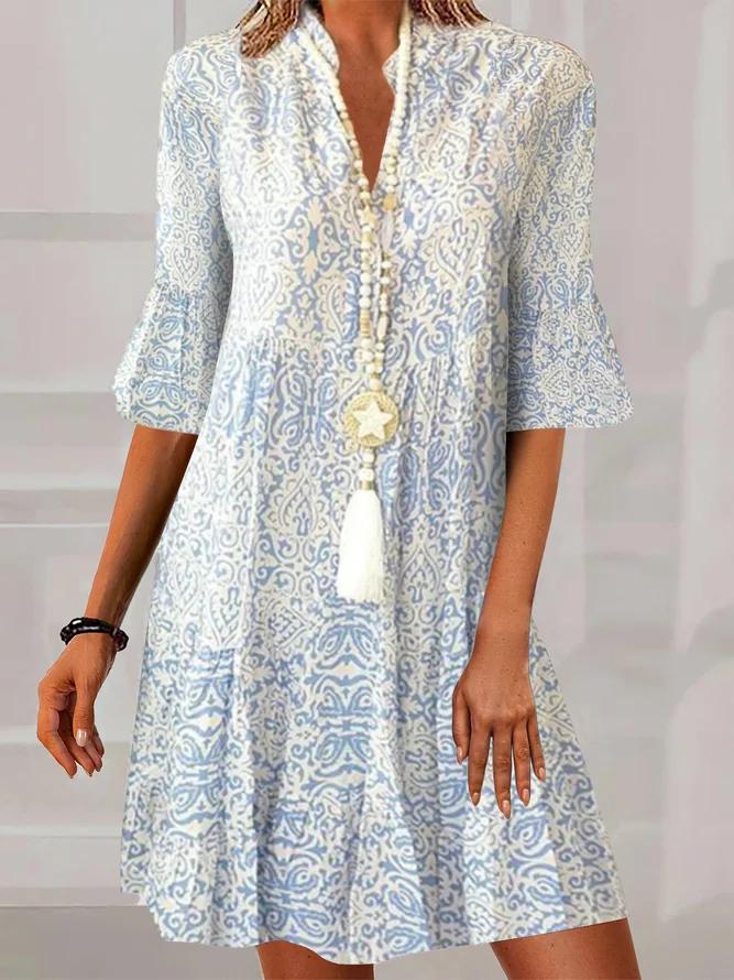 Silvia – Vintage-Minikleid mit blau-weißem Muster und halblangen Ärmeln