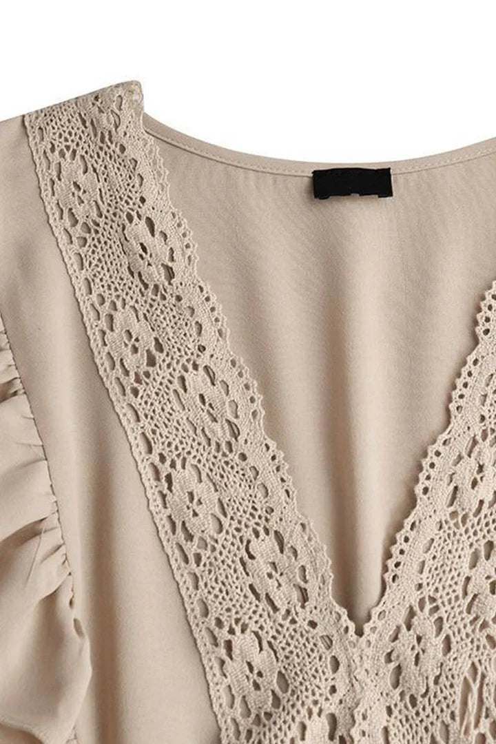 Blanca – Maxikleid aus Spitze mit V-Ausschnitt und Volant