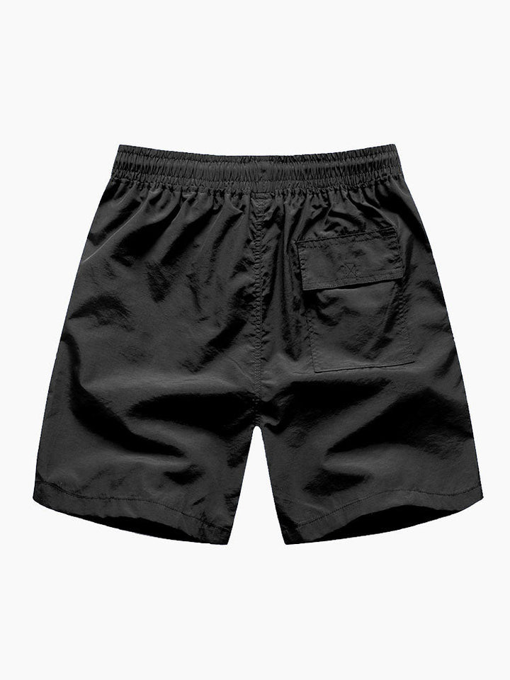 Hemd mit Schalprint und Badehose mit Knopfleiste
