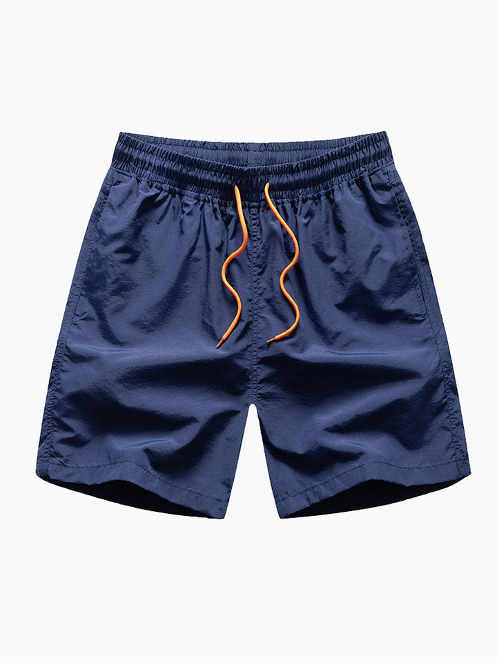 Hemd mit tropischem Blumenmuster und Badehose mit Knopfleiste