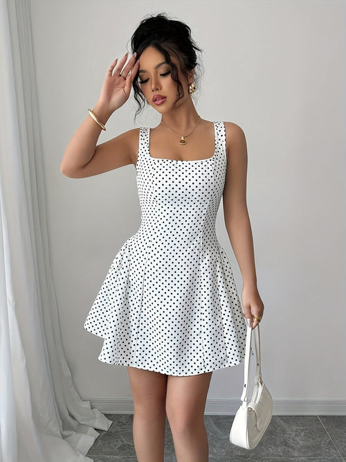 Elegantes Kurzarmkleid mit Polka-Dots und quadratischem Ausschnitt.