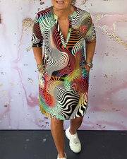 Ria Buntes V-Ausschnitt Kleid