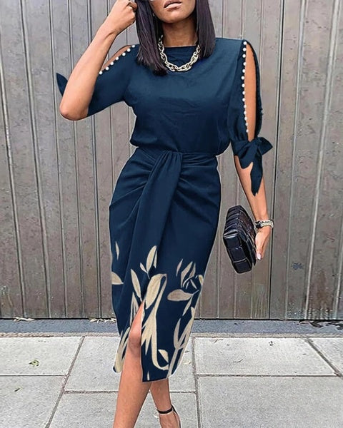 Selena – Gebundenes Arbeitskleid mit Perlendekor und botanischem Print