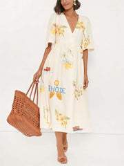 Midi-Kleid mit einzigartigem Folklore-Blumenmuster und Puffärmeln im Urlaubsstil